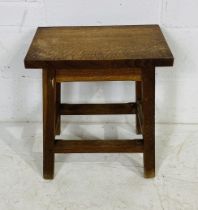 A small oak occasional table - height 52cm