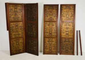 A Victorian mahogany four fold screen (A/F) with embossed wallpaper panels