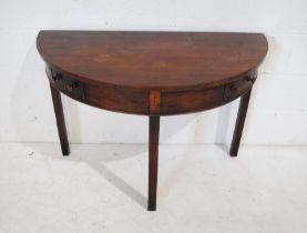 A Victorian mahogany demi-lune table with two drawers - length 106cm, depth 53cm, height 71cm