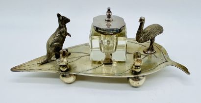 A silver plated ink stand by Stewart Dawson, Australia, surmounted by an emu and kangaroo