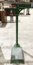 An antique set of scales by Stevens & Sons 'To weigh 24 stone' with green painted detail