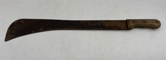 A vintage wooden handled machete