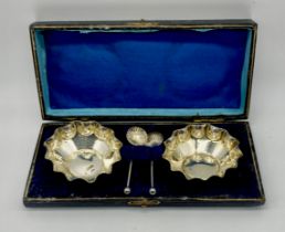 A cased set of hallmarked silver salts and spoons