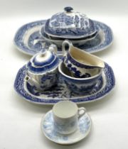 A collection of vintage blue and white china, meat plates, tea pots, also includes a Queen