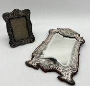 A large hallmarked silver Art Nouveau mirror A/F along with a hallmarked silver photo frame