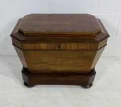 A Regency mahogany wine cellarette with original lining