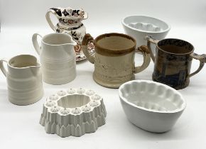 A collection of various antique china including loving cup decorated with views of Taunton, three