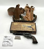 A boxed Colt SAA.45 CO2 4.5mm (.177) pellet air gun, along with two holsters and an ammo belt.