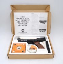 A boxed Webley Hurricane .177 air pistol, with targets, pellet tin, scope mount and instructions