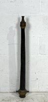 A large (93cm) antique bell metal firehose nozzle.