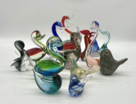 A collection of art glass birds including Murano