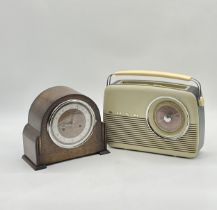 A vintage Bush radio along with an Enfield mantle clock.