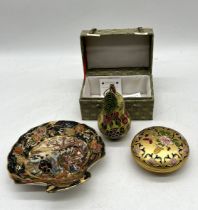 Three oriental items including a Cloisonne Pear.