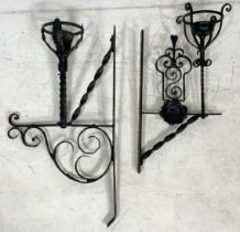 Two large wrought iron candle sconces