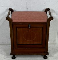 An Edwardian piano stool