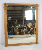 A large gilt framed over-mantle mirror, with bevel-edged glass - length 135cm, height 162cm