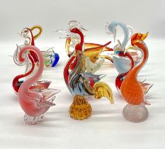 A collection of art glass birds including a number of pieces by Murano, two damaged as shown