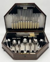 A canteen of wooden cased Walker & Hall cutlery presented to Alfred H Williams by the West
