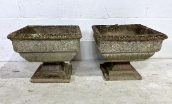 A pair of weathered concrete planters 52cm x 52cm, height 43cm