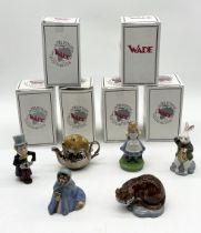 A collection of Wade Collector's Club Alice in Wonderland figures comprising of Alice, The Mad