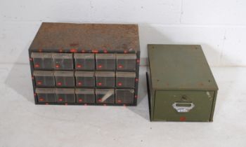A vintage industrial metal 'Veteran Series' single filing drawer, along with an 'Akao-Mils'