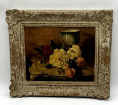 A framed still life unsigned oil painting of flowers. Overall size 46cm x 40cm