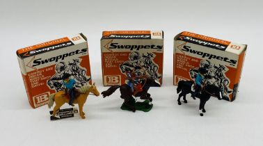 Three boxed Britains Swoppets Cowboy and Indian model figures including Cowboy On Guard Mounted (