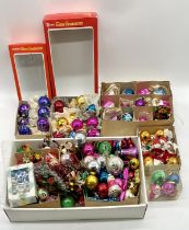 A large assortment of vintage Christmas decorations