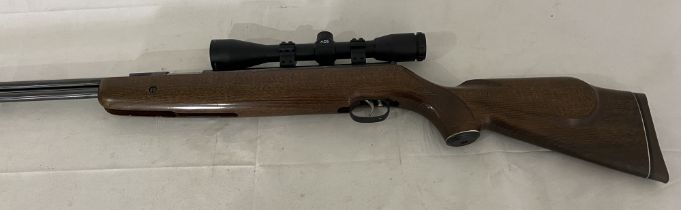 A Weihrauch HW77 .22 air rifle serial number 1655552 with AGS 4x40 scope in soft carry case