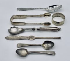 A small collection of hallmarked silver cutlery along with a silver napkin ring and silver handled