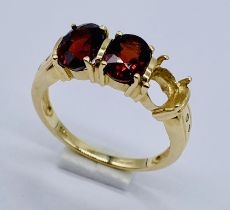 A 9ct gold garnet ring- 1 stone missing, total weight 3.2g