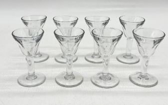 A set of 8 French Pastis glasses