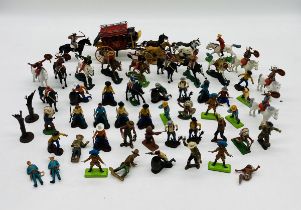 A collection of Cowboy and Indians plastic toy figurines (some mounted on horses, small selection on