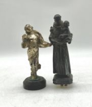A hood ornament style gilded female figure, along with a DSR figure of a Saint holding a child (