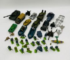 A collection of military related toys including Britains Deetail army figurines, tanks, boats,