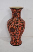 A large floor-standing Chinese red ground vase, with floral decoration - diameter 34cm, height 77.