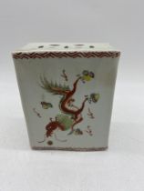 A 19th century Chinese porcelain flower brick/incense burner decorated on one side with a dragon