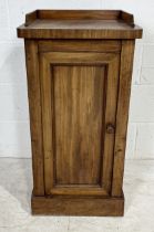 A Victorian mahogany pot cupboard with gallery top