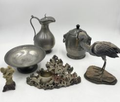 A collection of various items including soapstone figure, hammered pewter bowl, ceramic heron etc.