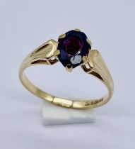 A 9ct gold garnet ring