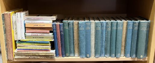 A collection of books including numerous Arthur Ransome titles, AA Milne including first edition "