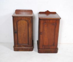 A near pair of Victorian mahogany bedside cabinets