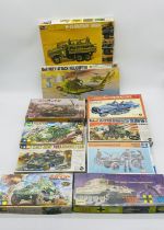 A collection of ten boxed military vehicles plastic model kits including Revell U.S Army M-35