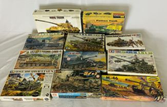A collection of eleven boxed military tanks plastic construction kits including Tamiya King Tiger