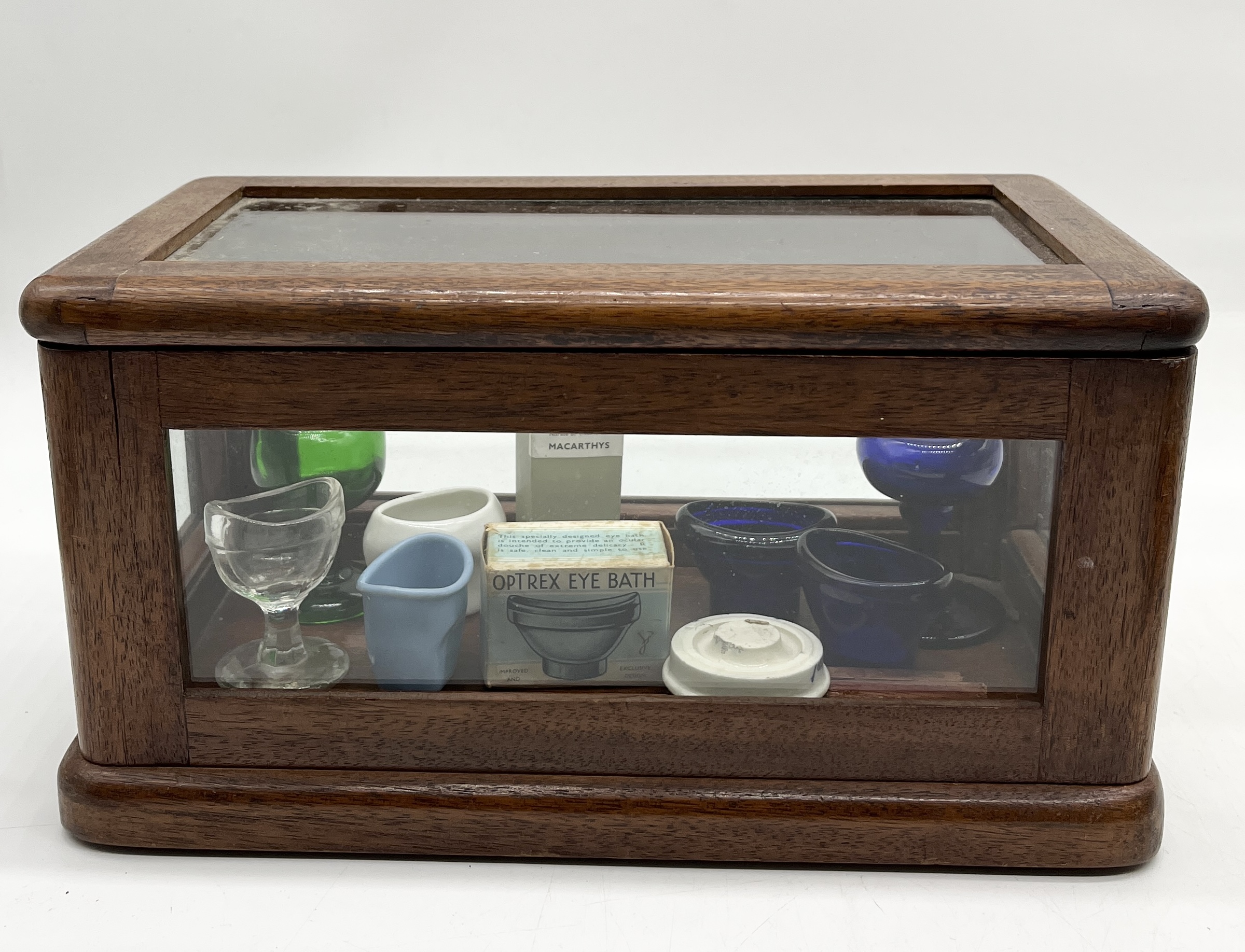 A collection of chemists bottles and bell jars along with a small wooden medical cabinet - Image 3 of 4