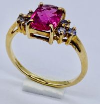 A Rubellite and tanzanite ring set in 9ct gold