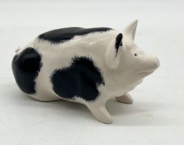 A black and white Wemyss pottery pig commemorating "Wootton Fitzpaine 2000"