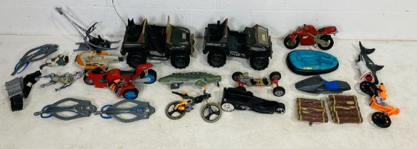A collection of various Action Man vehicles and accessories including jeeps, boats, motorbikes etc -