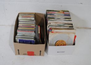 A quantity of 7" vinyl records, including Queen, Freddie Mercury, Steeleye Span, George Harrison,