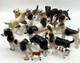 A large collection of ceramic dogs including Melba Ware, some A/F